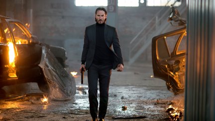 John Wick walking through flames
