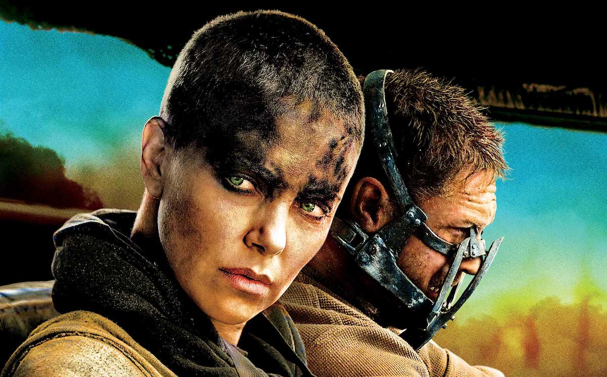 Furiosa and Max drive in Mad Max: Fury Road.