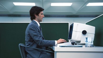 severance mark sitting at a table